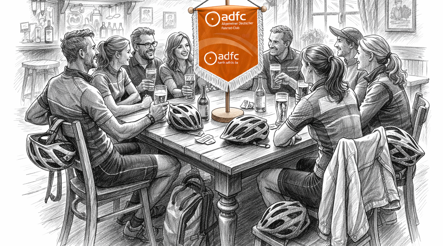 Radler sitzen in einer Kneipe um einen Tisch